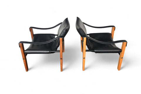 PAIR OF MAURICE BURKE SAFARI LOUNGE CHAIRS + OTTOMAN