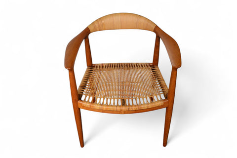 Vintage Danish chair by Hans Wegner, teak craftsmanship with cane seat detail