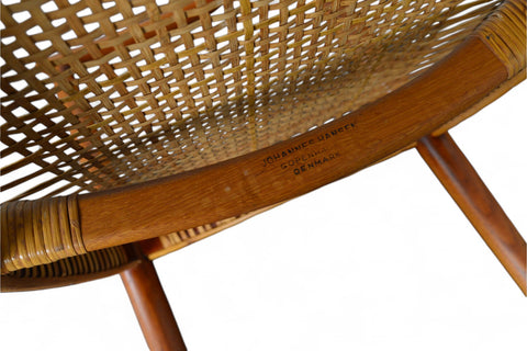 Hans Wegner Round Chair 1949 model, teak wood arms with cane seat construction