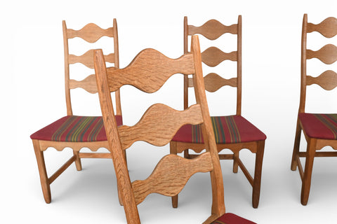 SET OF FOUR HIGHBACK DINING CHAIRS IN OAK BY HENNING KJAERNULF