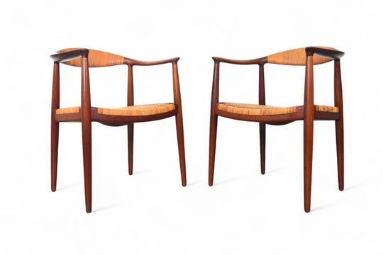 PAIR OF HANS WEGNER JH-501 ROUND CHAIRS IN TEAK + CANE