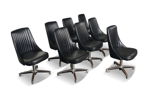 Set of eight 1960s Chromcraft swivel dining chairs in original black vinyl