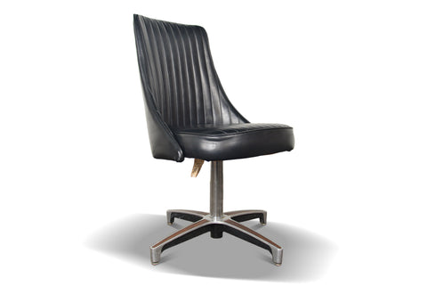 Black vinyl Chromcraft chairs with walnut base accents, original mid-century design