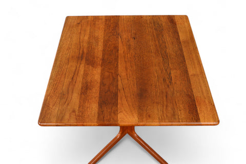 Top view of solid teak small pedestal table showcasing wood grain.
