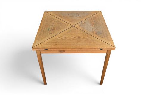 Danish modern oak card dining table with triangular expanding leaves, closed view, 1950s Denmark