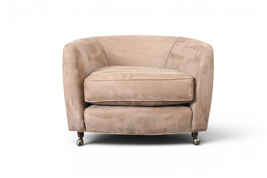 MID CENTURY TUB CHAIR IN THE MANNER OF MILO BAUGHMAN
