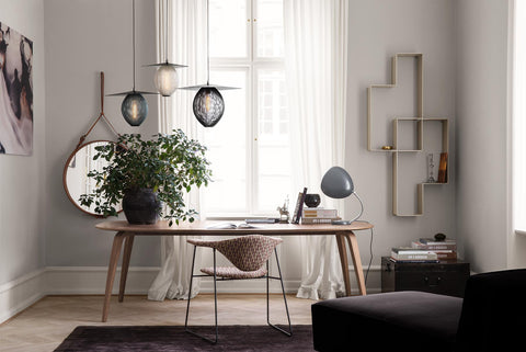 Elliptical gubi dining table dining room scene