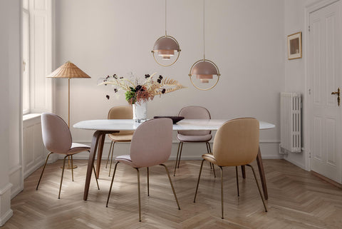 Gubi rectangular dining table medium in a modern dining space