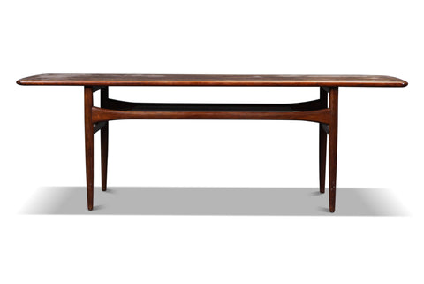 Side view of Robert Christiansen coffee table with clean lines and sturdy base.