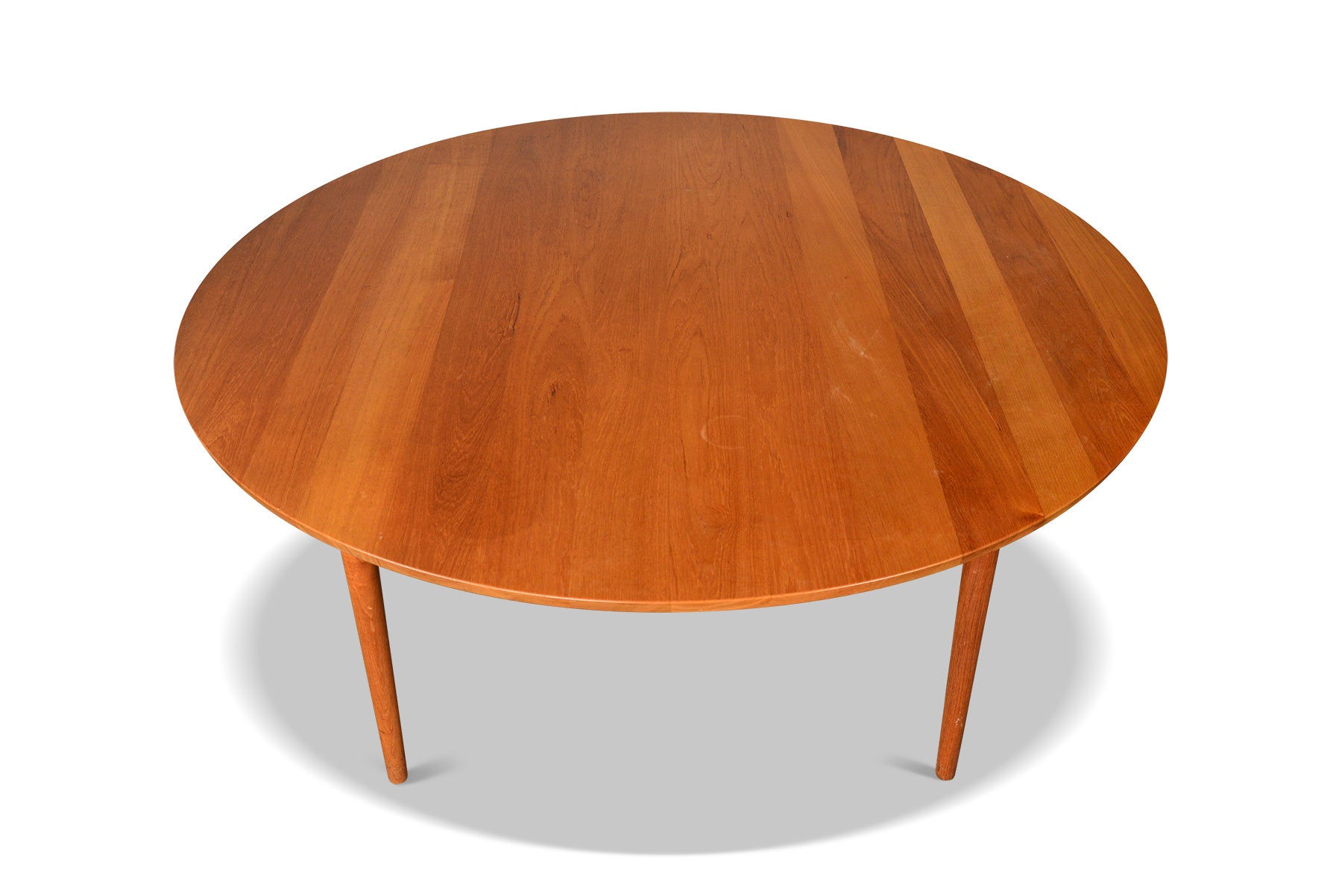 RARE 63" ROUND SOLID TEAK DINING TABLE BY CADO